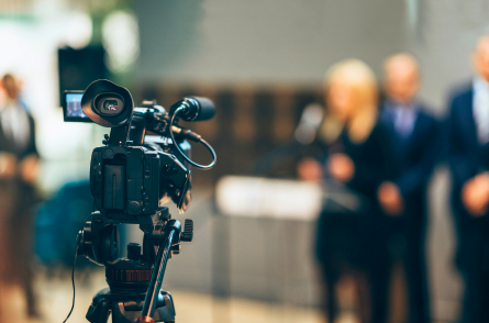 A team of journalists preparing to interview people.